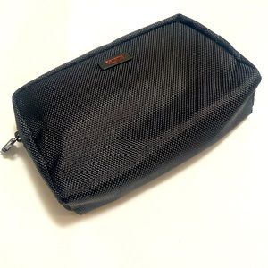 Tumi new black pouch with contents